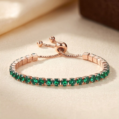 Verstellbares Tennisarmband mit Smaragd in Gold