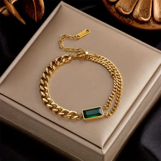 Goldenes Armband mit Smaragd-Barrette