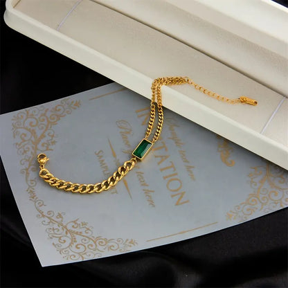 Goldenes Armband mit Smaragd-Barrette